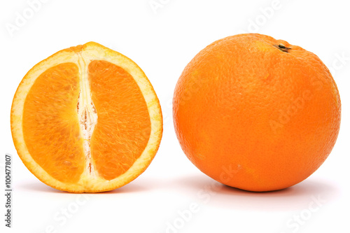 Cross section of ripe orange on white background. Clipping path incl.