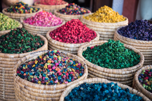 Dried flower heads in baskets for sale in the souk in Marrakesh