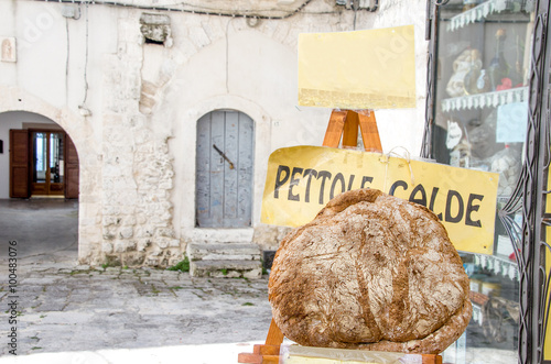 Pugliese bread in apulia village alley