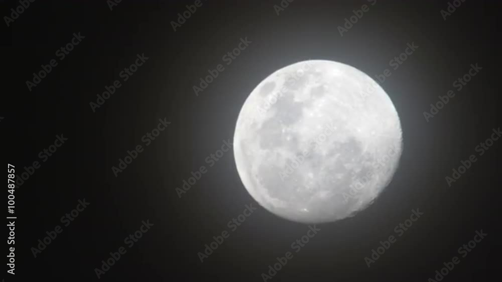 Shot of full moon in the night sky Shot of full moon in the night sky