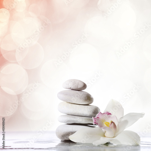 Beautiful composition with spa stones on light background  close up