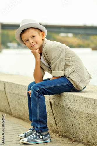 Little boy on the riverside