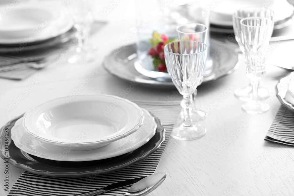 Table set at restaurant on light background Table set at restaurant on light background