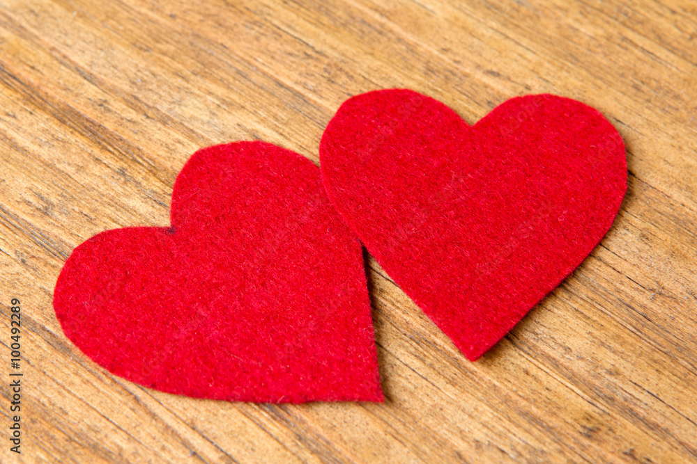 Valentine hearts on rustic wooden background Valentine hearts on rustic wooden background