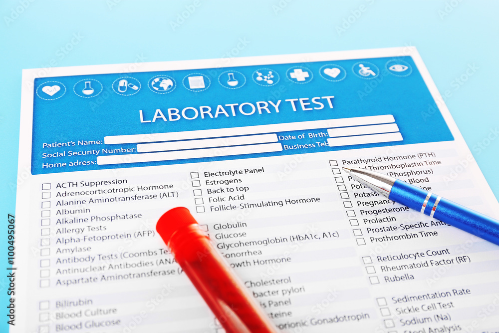 Blood in test tubes, pen and investigation form on the table