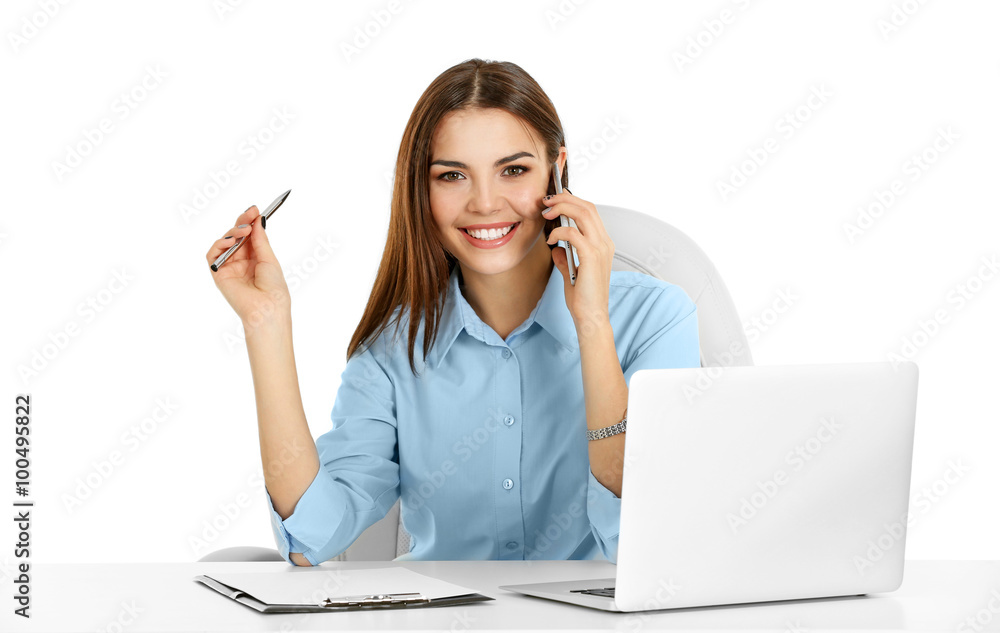 A beautiful woman talking on phone at the office, isolated on white A beautiful woman talking on phone at the office, isolated on white