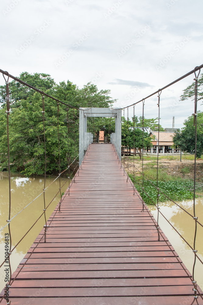 The wooden hanging bridge , mangrove