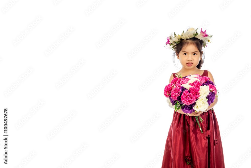 Beautiful little girl in red dress with flowers