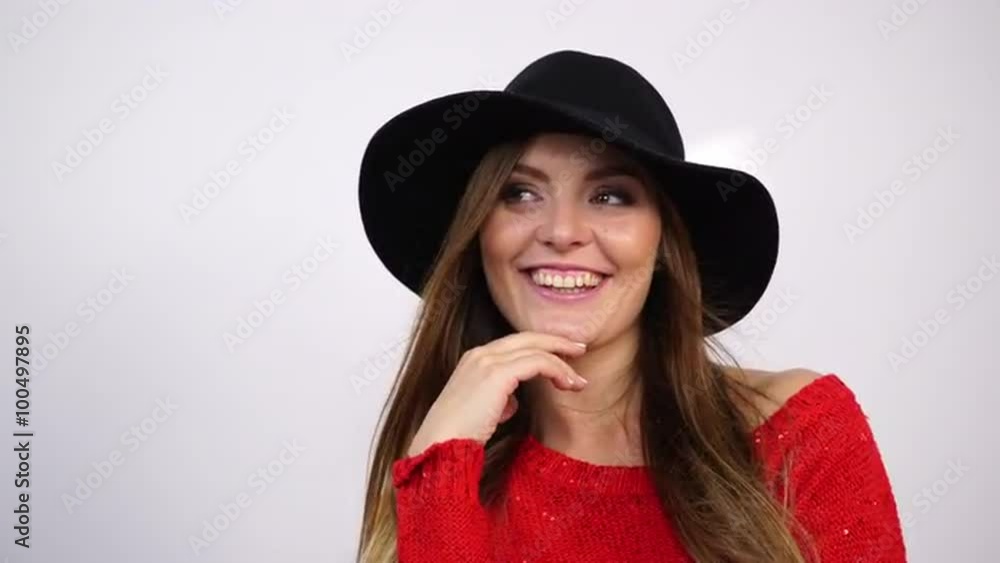 Woman in hat and red sweater. Smiling girl 4K. Woman in hat and red sweater. Smiling girl 4K.