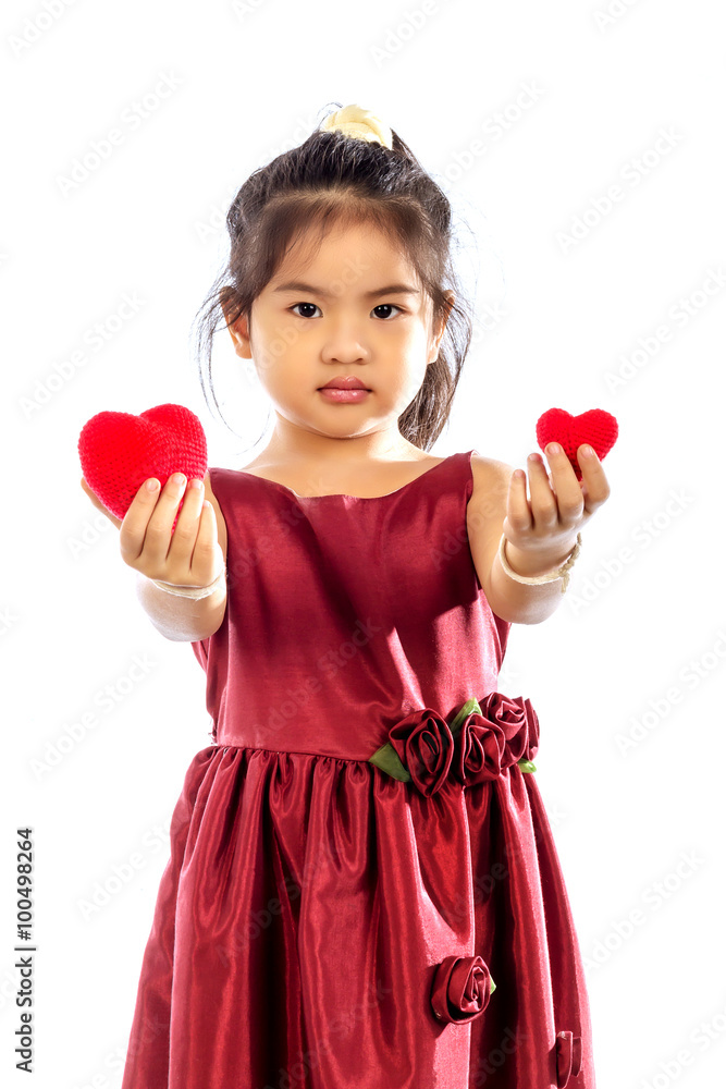 Beautiful little girl in red dress with red heart Beautiful little girl in red dress with red heart