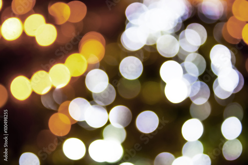 abstract bokeh background in the night , blur light background , yellow and white color
