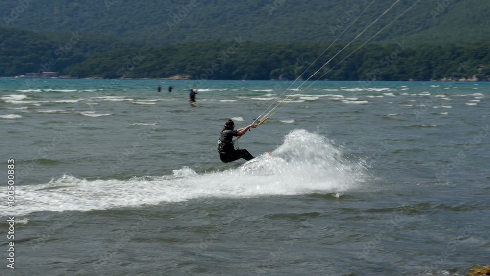 Akyaka, Turkey, Kitesurfer Kite Surfing at sea Akyaka, Turkey, Kitesurfer Kite Surfing at sea