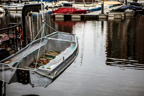 Wallpaper Mural NETHERLANDS, AMSTERDAM - OKTOMBER 24, 2015: Channel with parking boat in Amsterdam. Torontodigital.ca