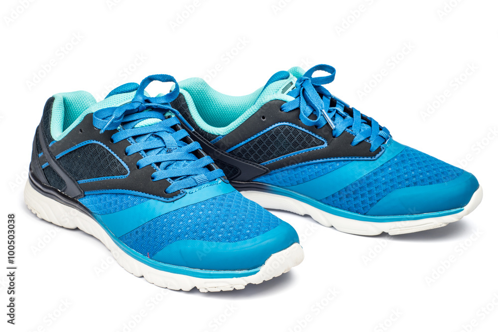 Picture of a pair of blue trainers over a white background Picture of a pair of blue trainers over a white background