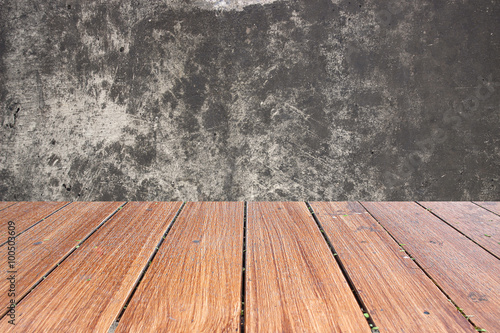 Top fo wood table on concrete wall background. you can be used for display your products