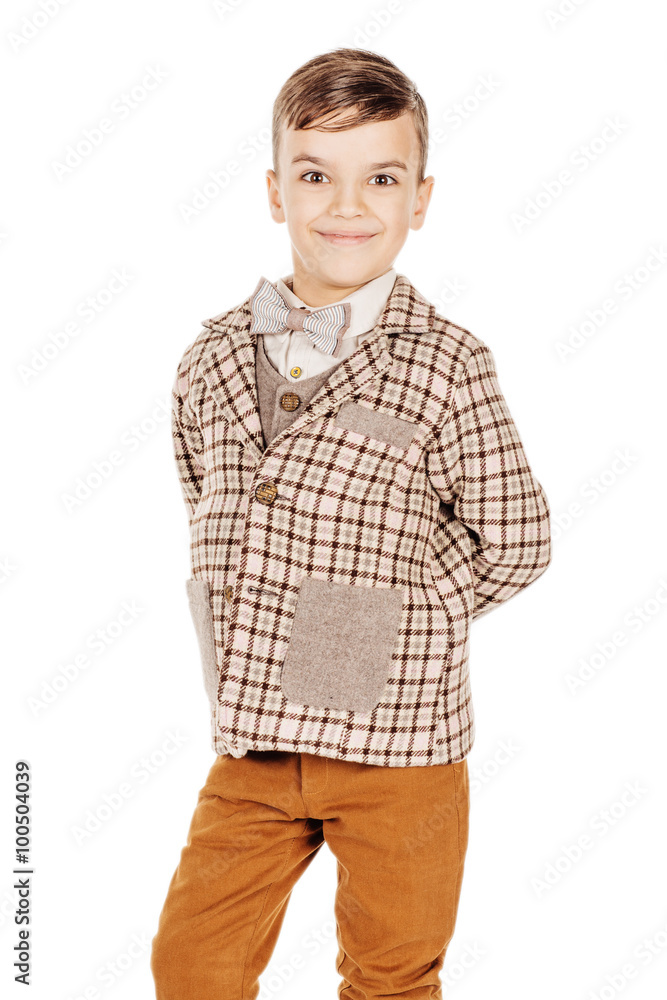 Portrait adorable young happy boy looking at camera isolated on Portrait adorable young happy boy looking at camera isolated on
