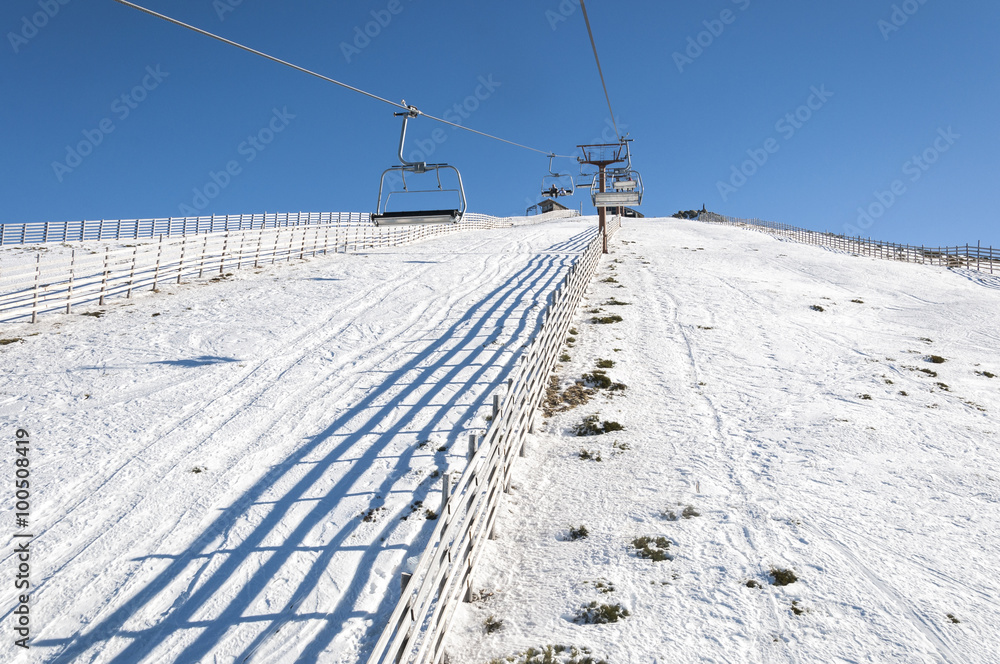 Chair lift in Navacerrada Ski Resort, Navacerrada Mountain Pass, Madrid, Spain, on January 4, 2015