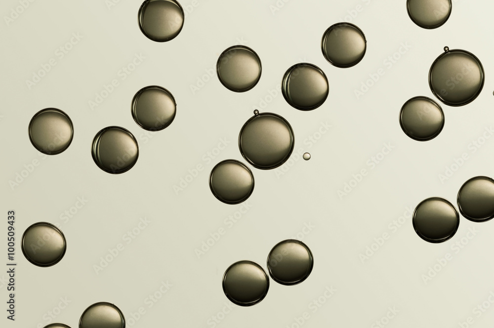 Dark black air bubbles flowing over a colored bacckground Dark black air bubbles flowing over a colored bacckground