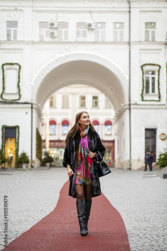 Young beautiful woman in stylish mink coat © Andrey_Arkusha