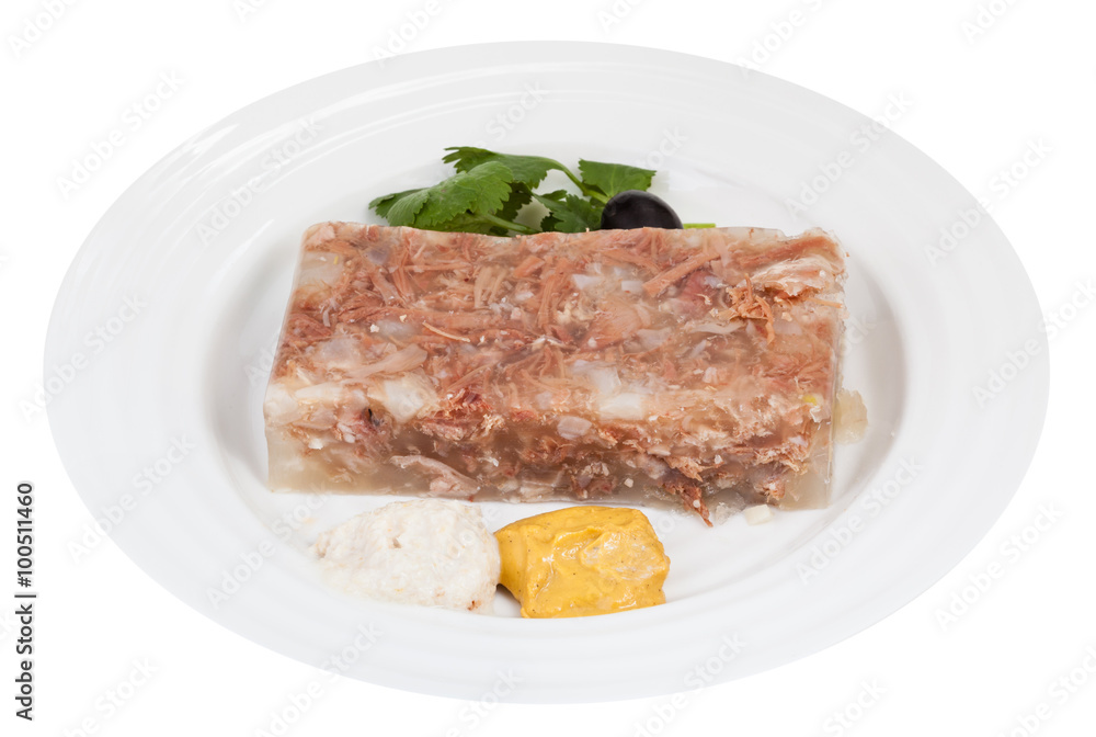 piece of meat aspic with seasonings on white plate