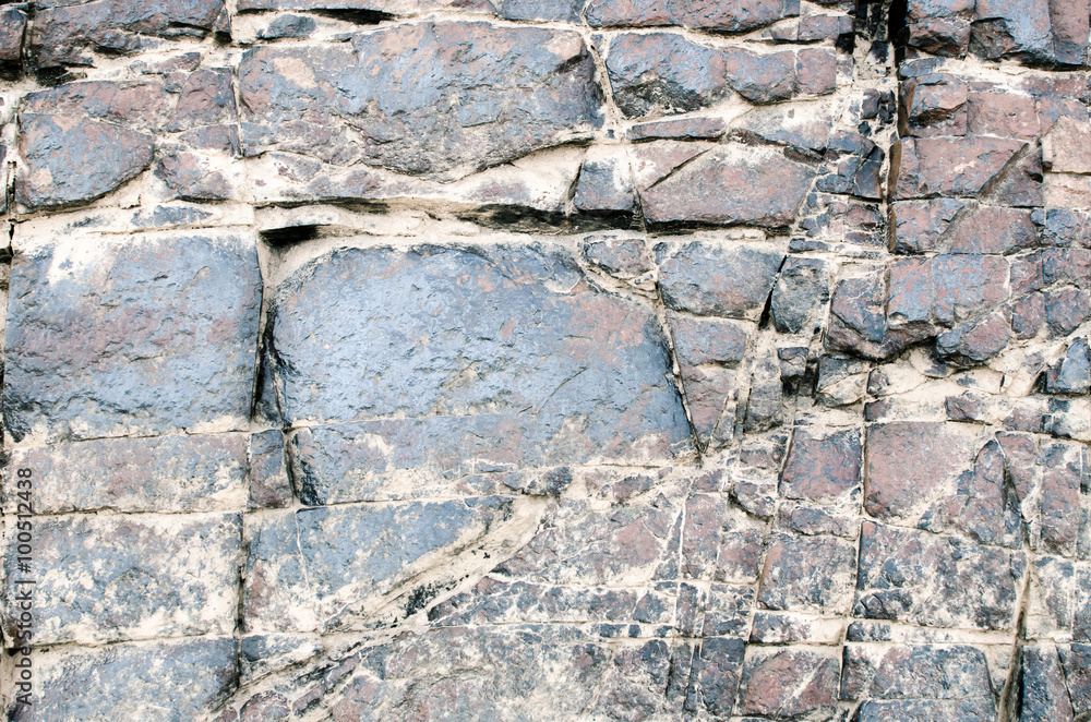 Fototapeta premium Blue stone wall texture and background, Outdoor view