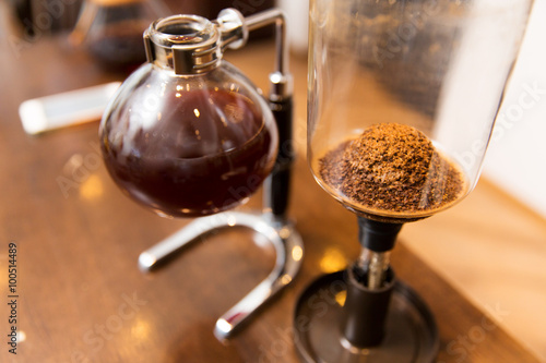 close up of siphon vacuum coffee maker at shop photo