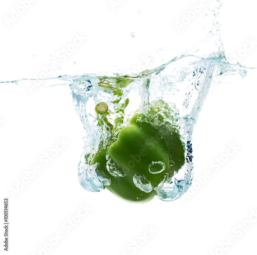 pepper falling or dipping in water with splash