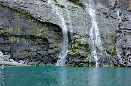 Waterfall with water from melting glacier near Godthaab Fjord, Greenland