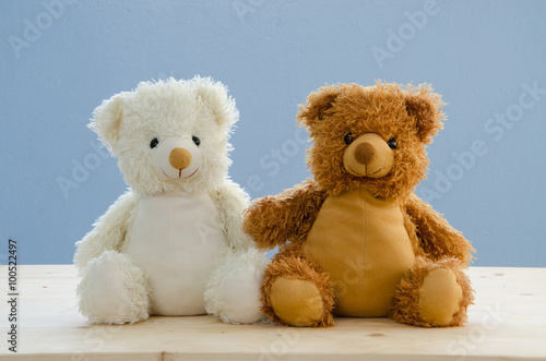 sweetheart bears with office desk and blue background.