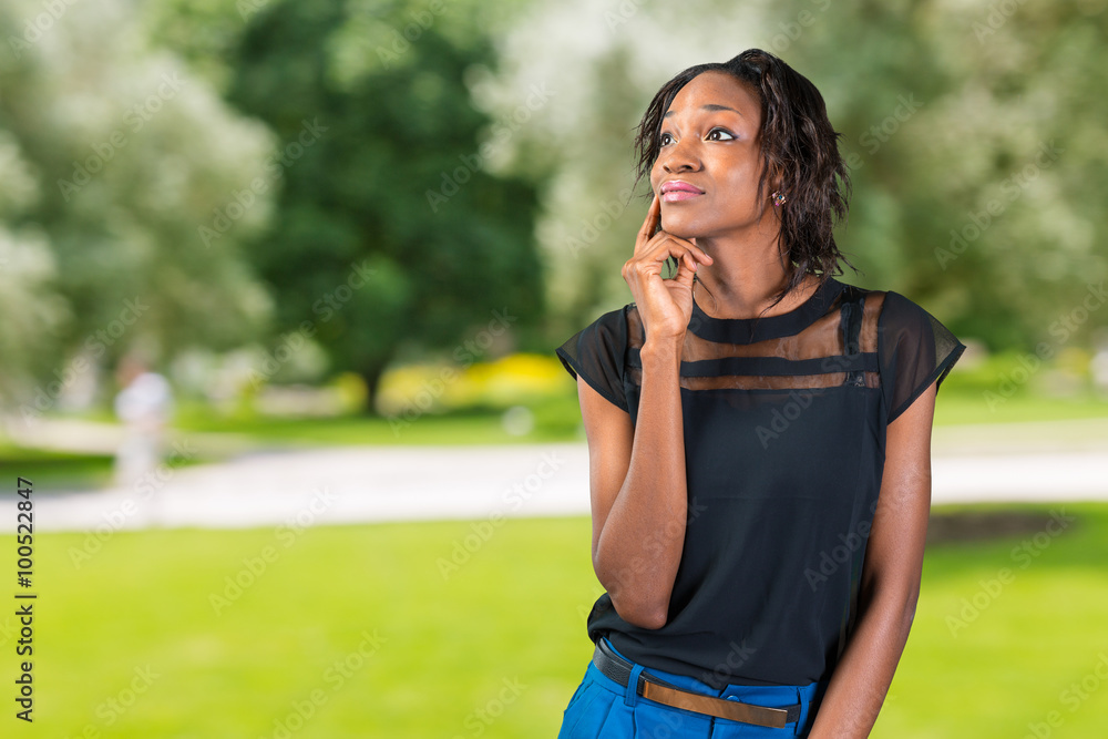 Young african woman, businesswoman thinking Young african woman, businesswoman thinking
