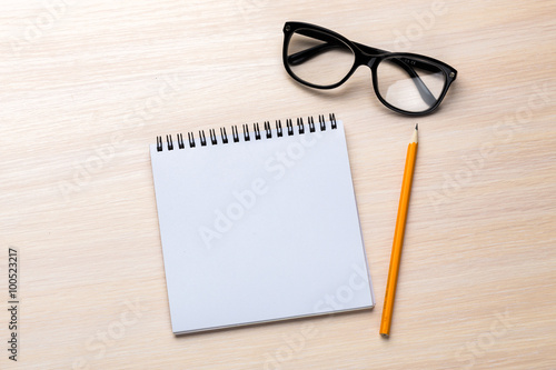Blank notepad with pencil