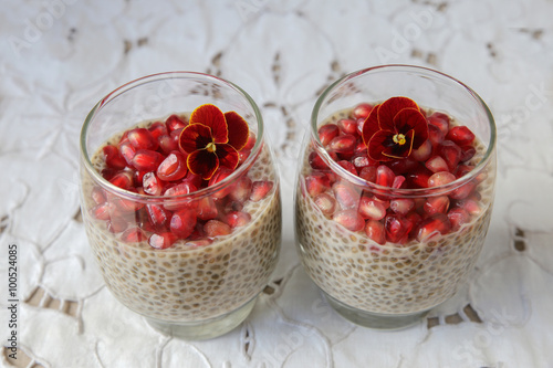 Chia seeds pudding with pomegranate, selective focus
