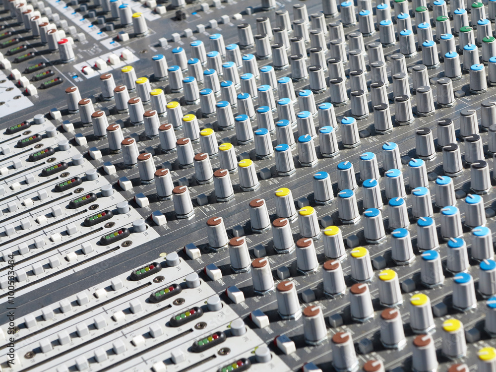 Obraz premium Giant audio sound mixer with color buttons and sliders