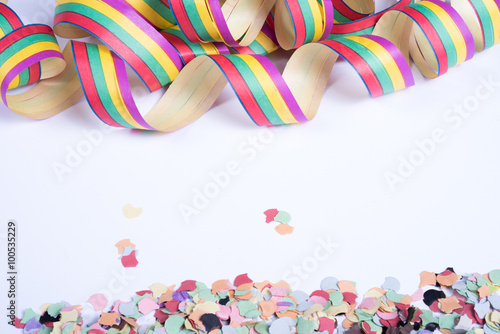 streamers and confetti for carnival on white background