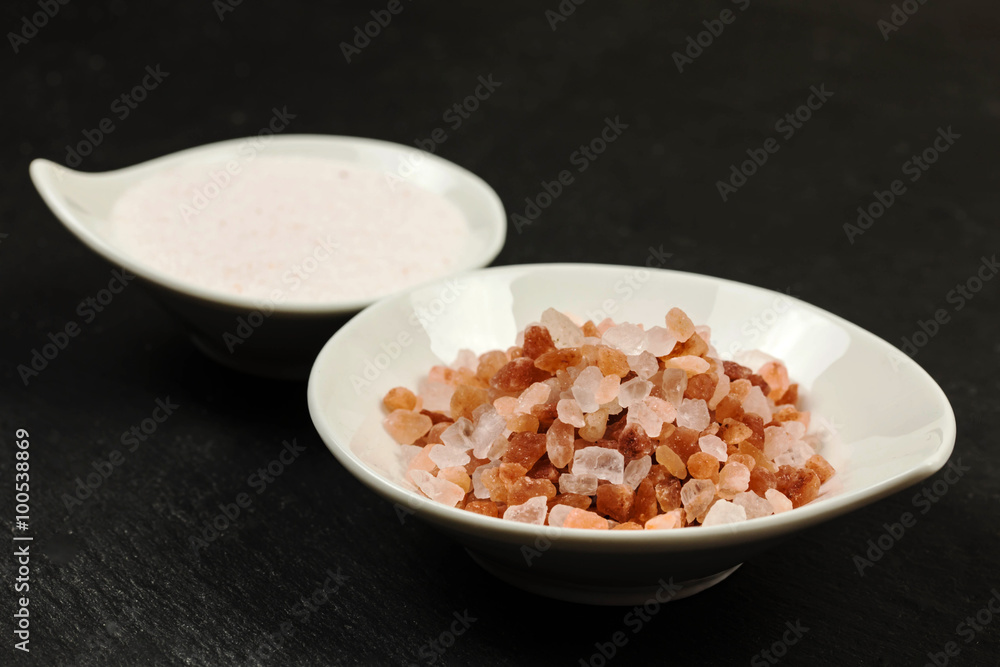 pink himalayan salt over slate background pink himalayan salt over slate background