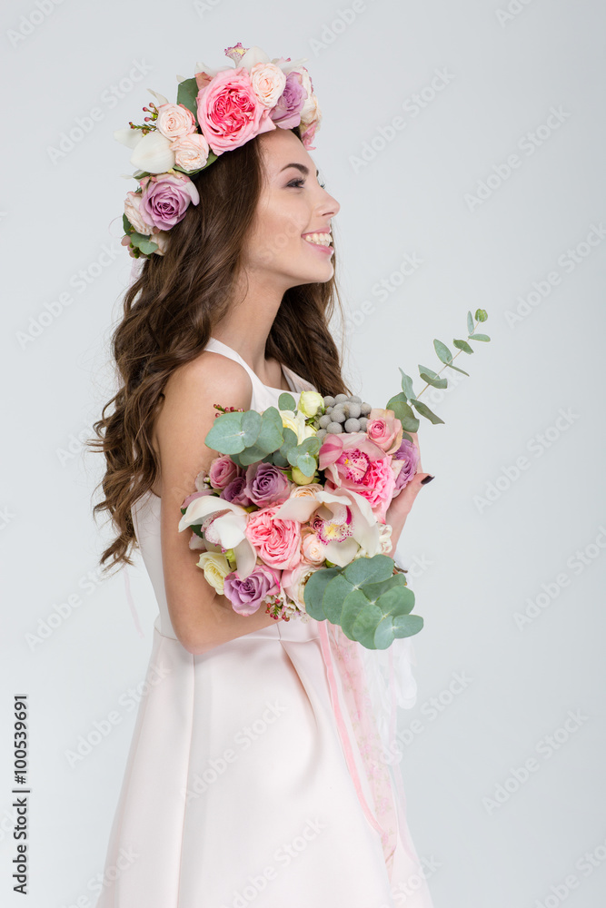 Profile of tender woman in flower wreath and wedding dress Profile of tender woman in flower wreath and wedding dress