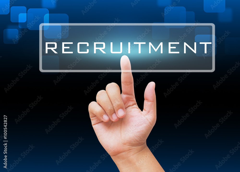 Hand pressing Recruitment button with technology background Hand pressing Recruitment button with technology background