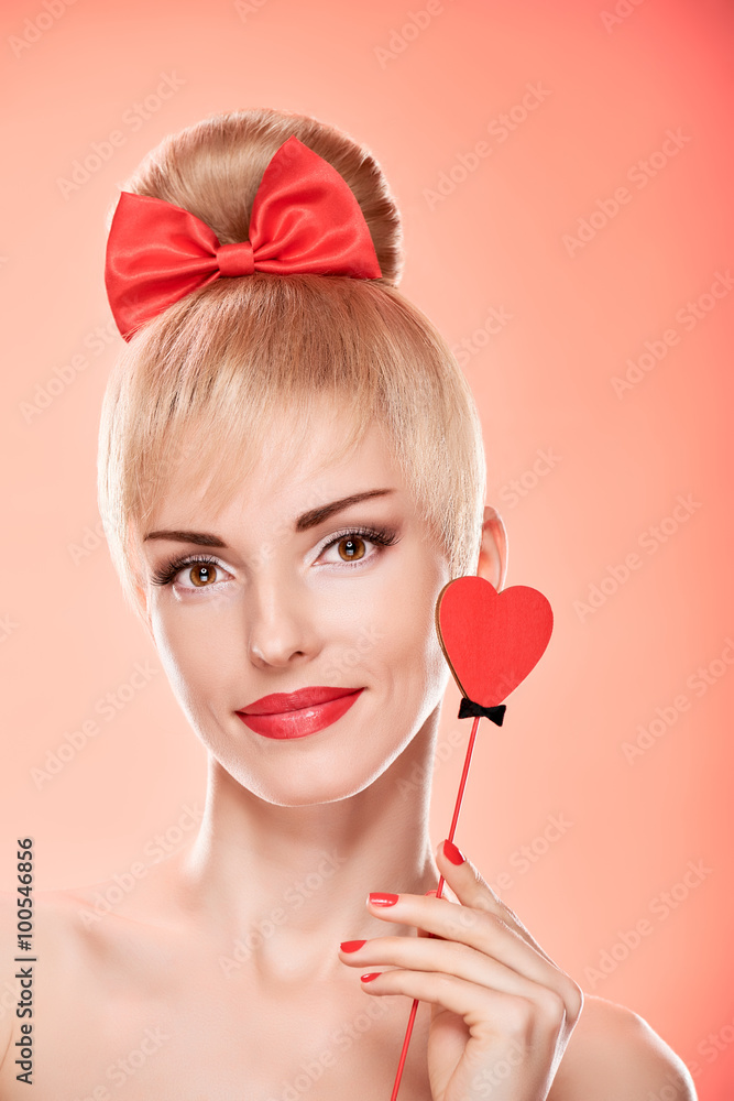 Beauty woman smiling with red heart.Valentines Day