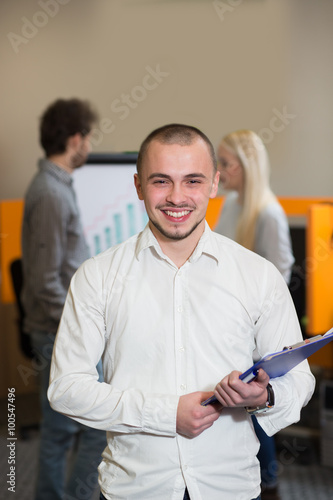 Portrait of young confident men employee dressed in casual cloth