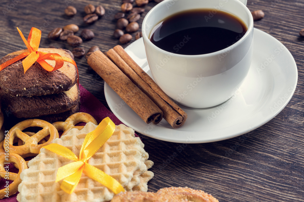 Biscuits and coffee on table Biscuits and coffee on table