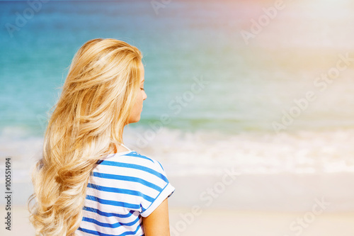 Young woman relaxing on the beach