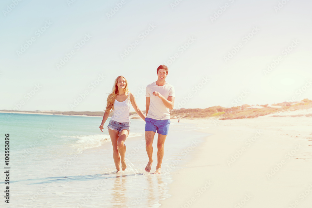 Romantic young couple on the beach Romantic young couple on the beach