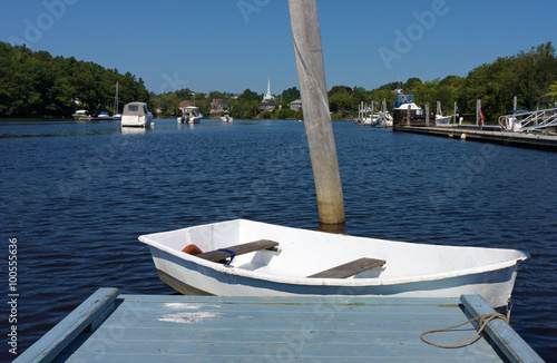 Dinghy at end of dock photo