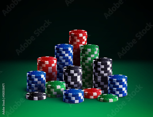 casino chips isolated on green background
