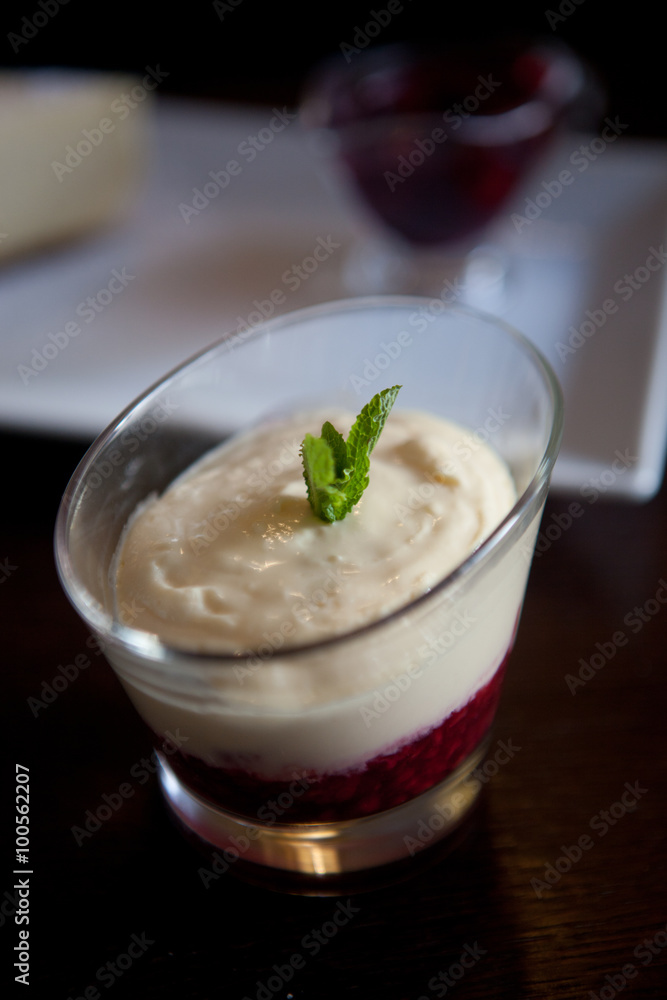 Close up photograph of a fancy panna cotta with strawberries Close up photograph of a fancy panna cotta with strawberries