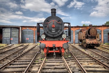 Fotobehang Trein Klassieke stoomlocomotief in vol bedrijf  © Radoslaw Maciejewski