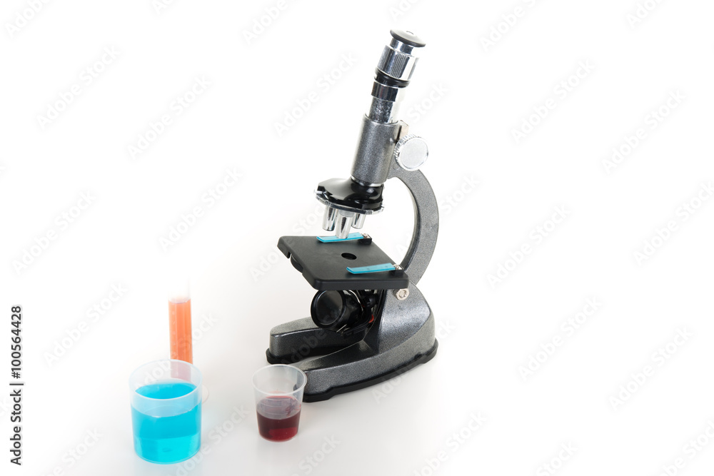 Side view of a grey microscope isolated on white background Side view of a grey microscope isolated on white background