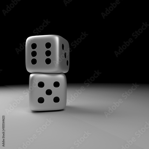 two silver dice over dark