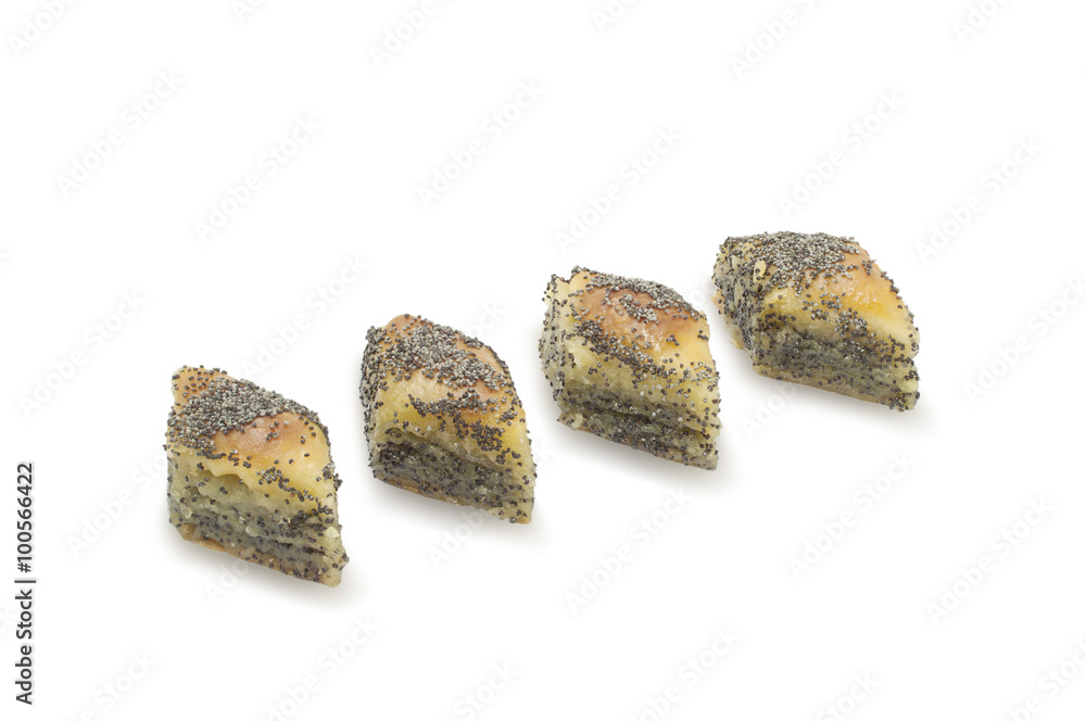 Several cakes Baklava with poppy-seed and honey isolated on white background