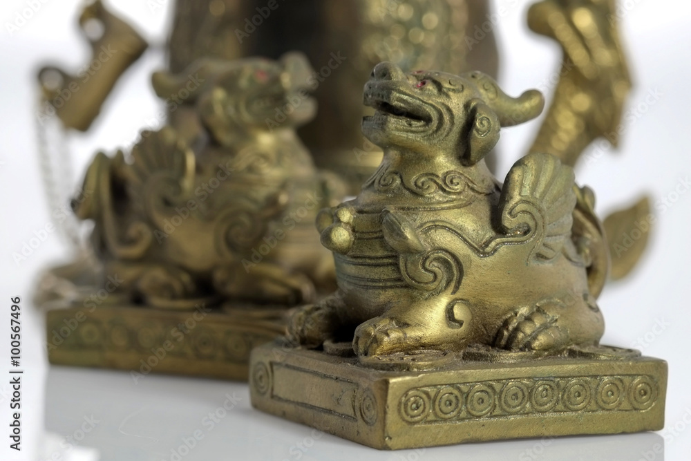 Chinese lion sculpture / Chinese lion sculpture on white background. Chinese lion sculpture / Chinese lion sculpture on white background.